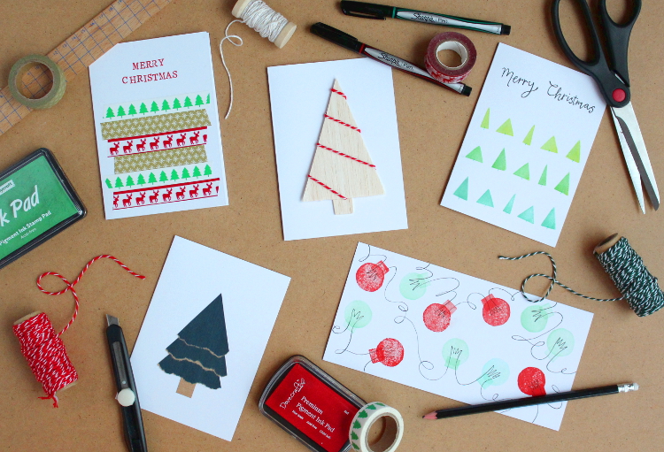 Craft supplies and and an assortment of handmade Christmas Cards.