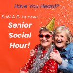 Two older women are being showered with confetti.  One woman is wearing a gold party hat, sunglasses and a silver tinsel boa.