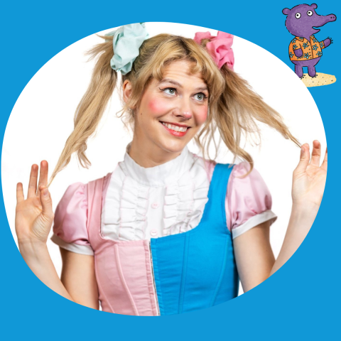 Miss Make-Believe is smiling and holding her pig tails.