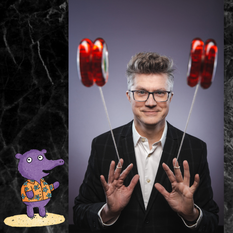 A picture of Mark Hayward spinning two red yo-yos toward the camera.