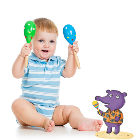 A baby playing maracas.