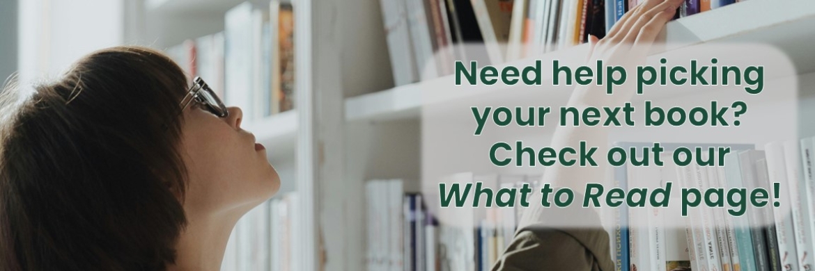 A person looking at books on a bookshelf. Text: Check out our What to Read page.